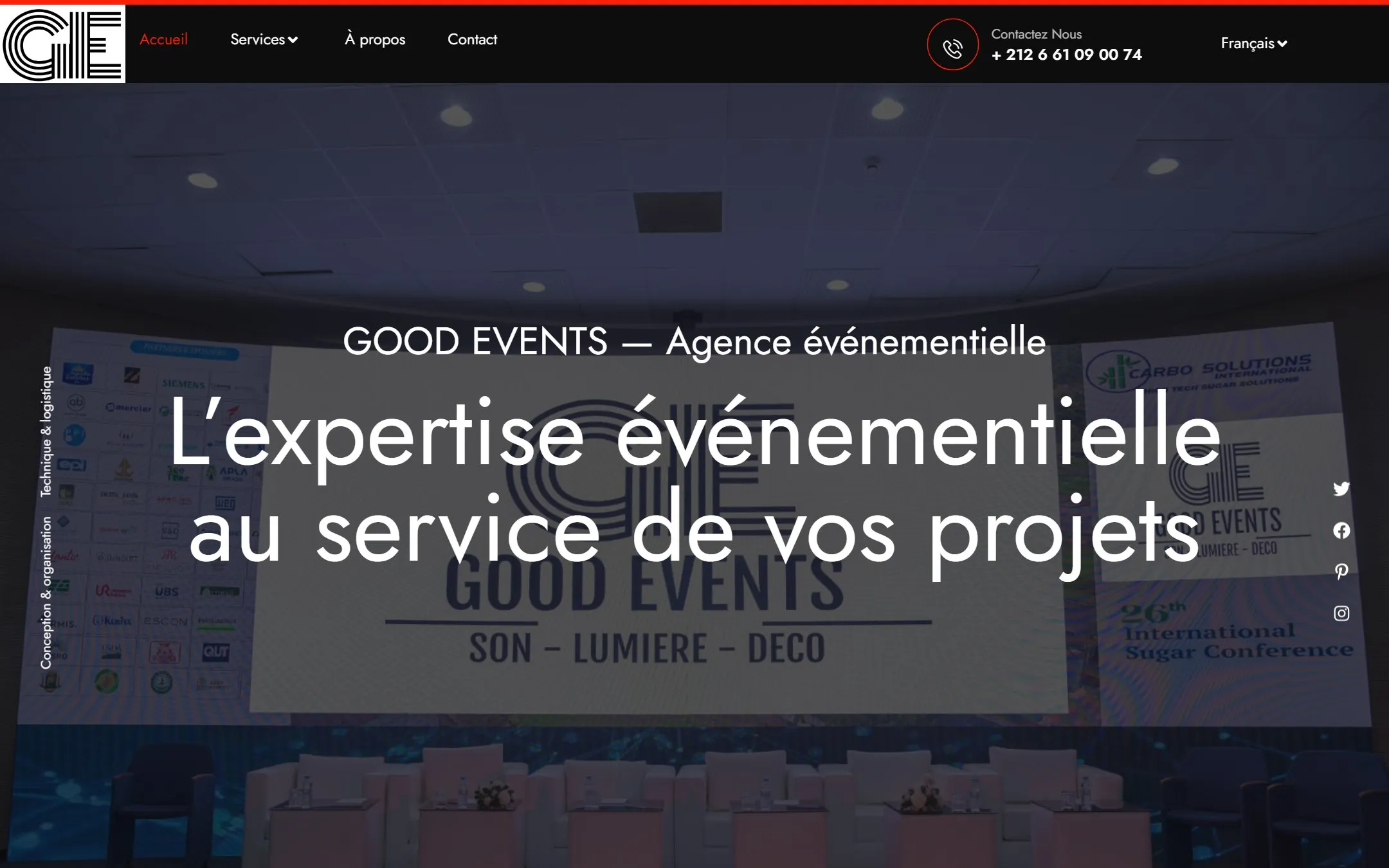 Good Events homepage in French, with a conference stage photo and the headline “L'expertise événementielle au service de vos projets”.
