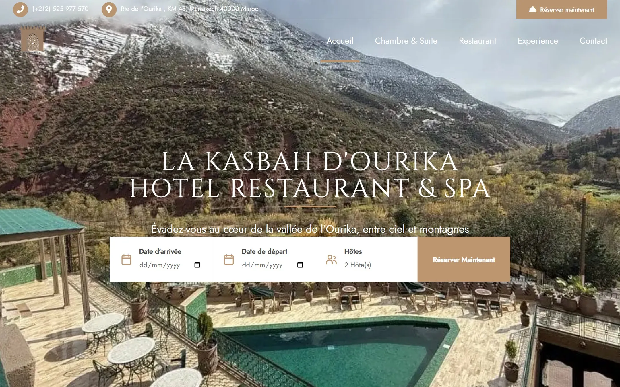 La Kasbah d'Ourika homepage showing the Ourika valley mountains above the hotel pool terrace, with a booking bar for arrival, departure and guests.